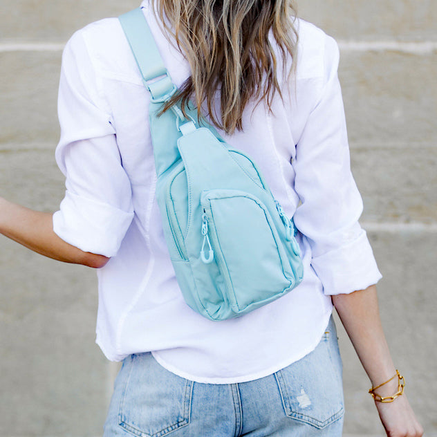 Pippa vendbar slingbag i nylon