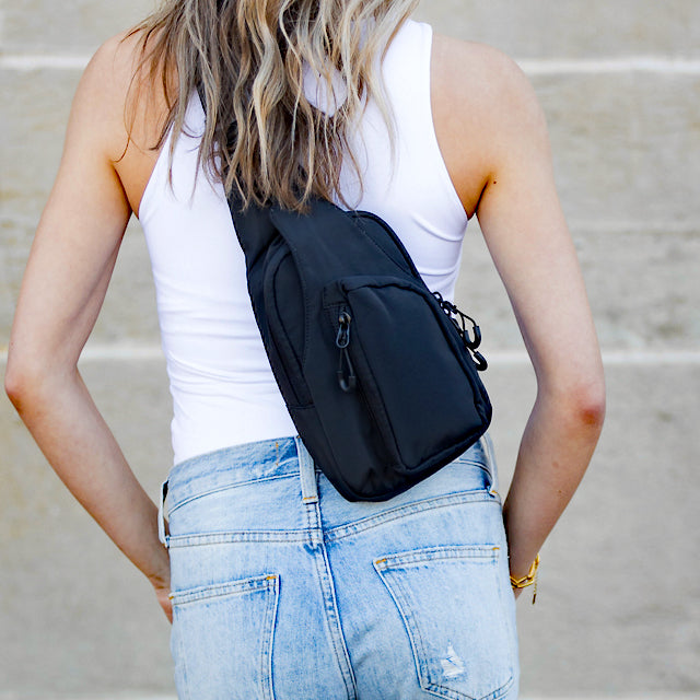 Pippa vendbar slingbag i nylon