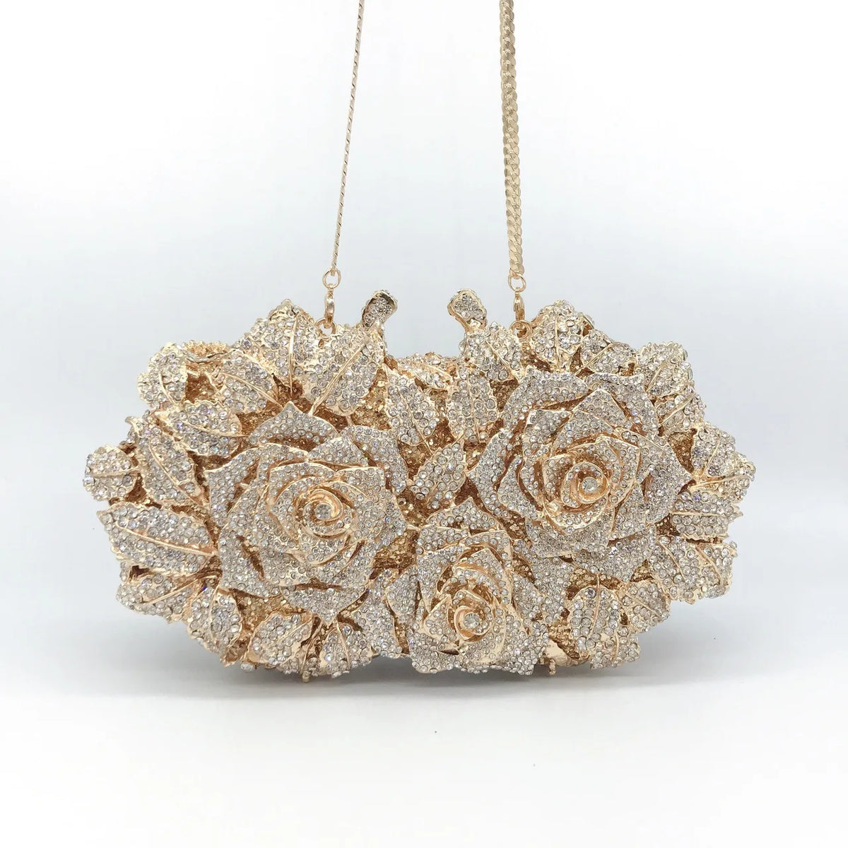 Luxury rhinestone evening clutch with rose design, perfect for weddings and formal events, sparkling gold and silver tones.
