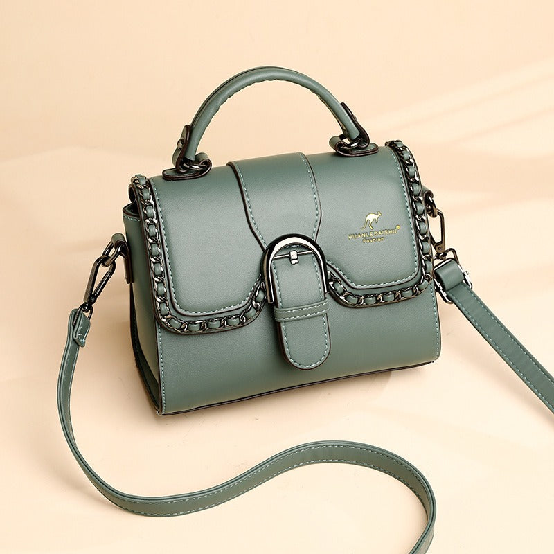 luxury PU shoulder bag for women in green with chains and magnetic buckle, stylish designer handbag.